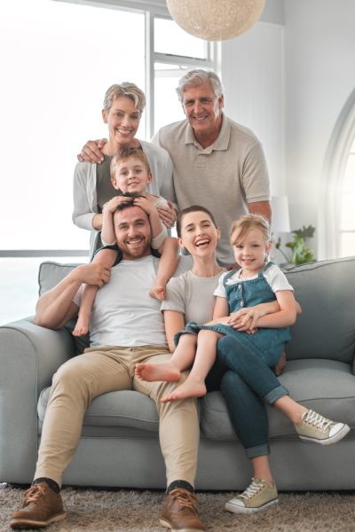 Happy,,People,And,Portrait,Of,Big,Family,On,Sofa,For